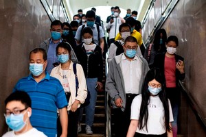 Covid-19 : la Chine confine une ville de quatre millions d'habitants